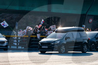 Ousted Ex-President Yoon Suk-yeol Leaves Official Residence, Greets Supporters
