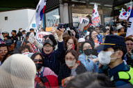 Ousted Ex-President Yoon Suk-yeol Leaves Official Residence, Greets Supporters