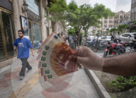 Daily Life In Tehran On The Day Of The Iran-U.S. Talks