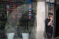 Daily Life In Tehran On The Day Of The Iran-U.S. Talks