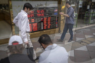Daily Life In Tehran On The Day Of The Iran-U.S. Talks