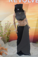 Superstar Teyana Taylor Shows Ripped Body In Crop Top And Form Fitting Skirt At The Revolve Festival In Thermal California - 12 April 2025