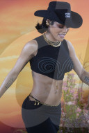 Superstar Teyana Taylor Shows Ripped Body In Crop Top And Form Fitting Skirt At The Revolve Festival In Thermal California - 12 April 2025