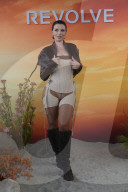 Actress Julia Fox In Very Revealing Bustier And Stockings At The Revolve Festival In Thermal California - 12 April 2025