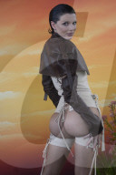 Actress Julia Fox In Very Revealing Bustier And Stockings At The Revolve Festival In Thermal California - 12 April 2025
