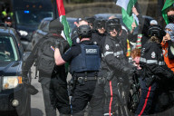 Demonstrators And Police Clash During Palestinian Solidarity Rally In Edmonton