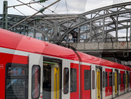 Youth Sitting On Hackerbrücke Above S-Bahn Train