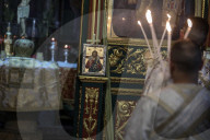 Palestinian Christians attend a Palm Sunday mass at the Greek Orthodox Saint Porphyrius Church, in Gaza CityGaza Christians observe Palm Sunday
