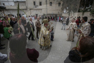 Palestinian Christians attend a Palm Sunday mass at the Greek Orthodox Saint Porphyrius Church, in Gaza CityGaza Christians observe Palm Sunday