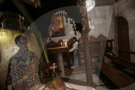 Palestinian Christians attend a Palm Sunday mass at the Greek Orthodox Saint Porphyrius Church, in Gaza CityGaza Christians observe Palm Sunday