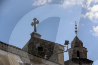 Palestinian Christians attend a Palm Sunday mass at the Greek Orthodox Saint Porphyrius Church, in Gaza CityGaza Christians observe Palm Sunday