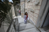 Palestinian Christians attend a Palm Sunday mass at the Greek Orthodox Saint Porphyrius Church, in Gaza CityGaza Christians observe Palm Sunday