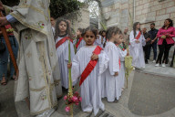 Palestinian Christians attend a Palm Sunday mass at the Greek Orthodox Saint Porphyrius Church, in Gaza CityGaza Christians observe Palm Sunday