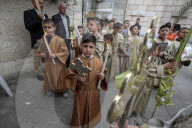 Palestinian Christians attend a Palm Sunday mass at the Greek Orthodox Saint Porphyrius Church, in Gaza CityGaza Christians observe Palm Sunday
