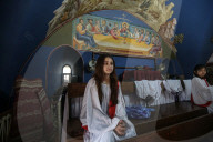 Palestinian Christians attend a Palm Sunday mass at the Greek Orthodox Saint Porphyrius Church, in Gaza CityGaza Christians observe Palm Sunday