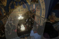 Palestinian Christians attend a Palm Sunday mass at the Greek Orthodox Saint Porphyrius Church, in Gaza CityGaza Christians observe Palm Sunday