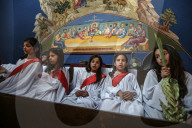 Palestinian Christians attend a Palm Sunday mass at the Greek Orthodox Saint Porphyrius Church, in Gaza CityGaza Christians observe Palm Sunday