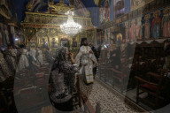 Palestinian Christians attend a Palm Sunday mass at the Greek Orthodox Saint Porphyrius Church, in Gaza CityGaza Christians observe Palm Sunday