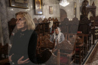 Palestinian Christians attend a Palm Sunday mass at the Greek Orthodox Saint Porphyrius Church, in Gaza CityGaza Christians observe Palm Sunday
