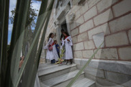 Palestinian Christians attend a Palm Sunday mass at the Greek Orthodox Saint Porphyrius Church, in Gaza CityGaza Christians observe Palm Sunday