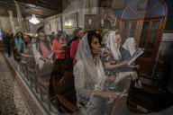 Palestinian Christians attend a Palm Sunday mass at the Greek Orthodox Saint Porphyrius Church, in Gaza CityGaza Christians observe Palm Sunday
