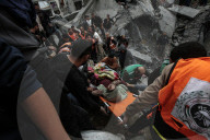 Gaza defense teams rescue victims of Israeli bombing