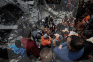 Gaza defense teams rescue victims of Israeli bombing