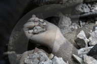 Gaza defense teams rescue victims of Israeli bombing