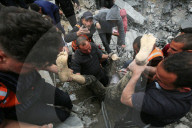 Gaza defense teams rescue victims of Israeli bombing