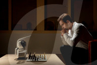 Chess playing robot makes its own moves