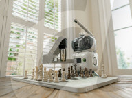 Chess playing robot makes its own moves