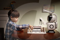 Chess playing robot makes its own moves
