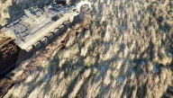Military plough clears mines and makes dirt roads