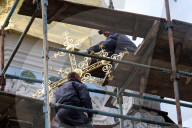 Blessing of cross at Trinity Gate Church in Kyiv