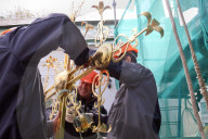 Blessing of cross at Trinity Gate Church in Kyiv