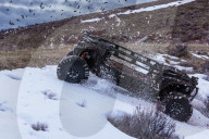 Autonomous military front line vehicle destroys drones