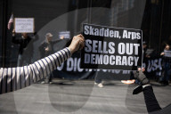 Protesters Demonstrate Outside Elite Law Firm Over Deal With Trump 