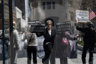 Protesters Demonstrate Outside Elite Law Firm Over Deal With Trump 