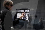 Protesters Demonstrate Outside Elite Law Firm Over Deal With Trump 