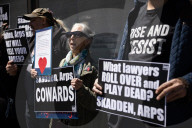Protesters Demonstrate Outside Elite Law Firm Over Deal With Trump 