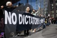 Protesters Demonstrate Outside Elite Law Firm Over Deal With Trump 