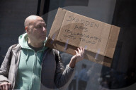 Protesters Demonstrate Outside Elite Law Firm Over Deal With Trump 