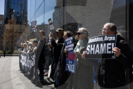 Protesters Demonstrate Outside Elite Law Firm Over Deal With Trump 