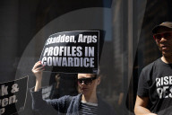 Protesters Demonstrate Outside Elite Law Firm Over Deal With Trump 