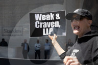 Protesters Demonstrate Outside Elite Law Firm Over Deal With Trump 