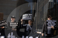 Protesters Demonstrate Outside Elite Law Firm Over Deal With Trump 