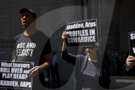 Protesters Demonstrate Outside Elite Law Firm Over Deal With Trump 