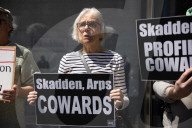 Protesters Demonstrate Outside Elite Law Firm Over Deal With Trump 