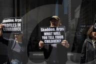 Protesters Demonstrate Outside Elite Law Firm Over Deal With Trump 