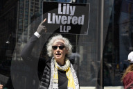 Protesters Demonstrate Outside Elite Law Firm Over Deal With Trump 
